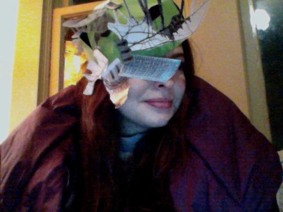 I made this hat out of construction paper and photographs at my friend Nate's party.